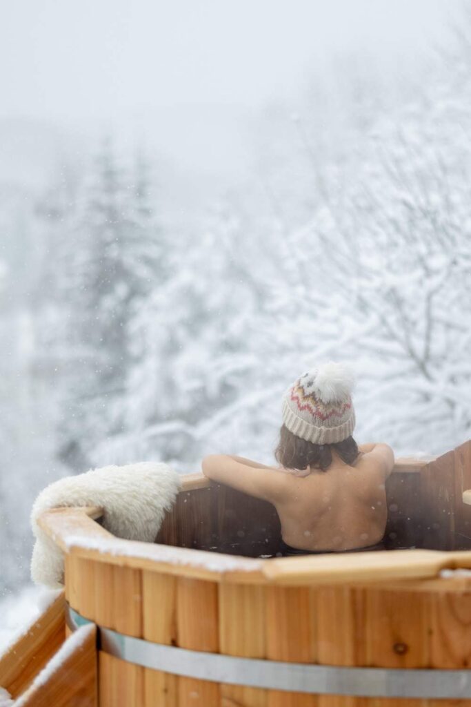 woman in hot tub in Lake tahoe in winter